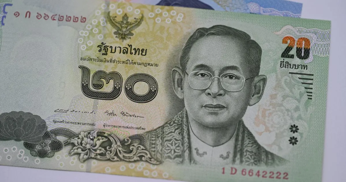 Thai baht banknotes, illustrating Thailand personal income tax for long-stay foreigners.